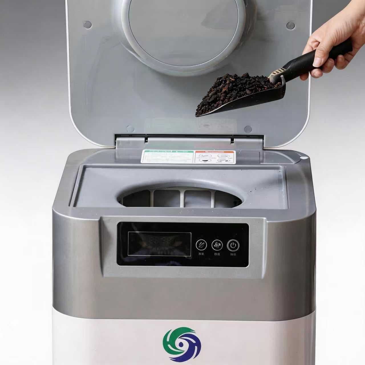 Collecting finished organic compost from a home compost bin after processing kitchen food scraps