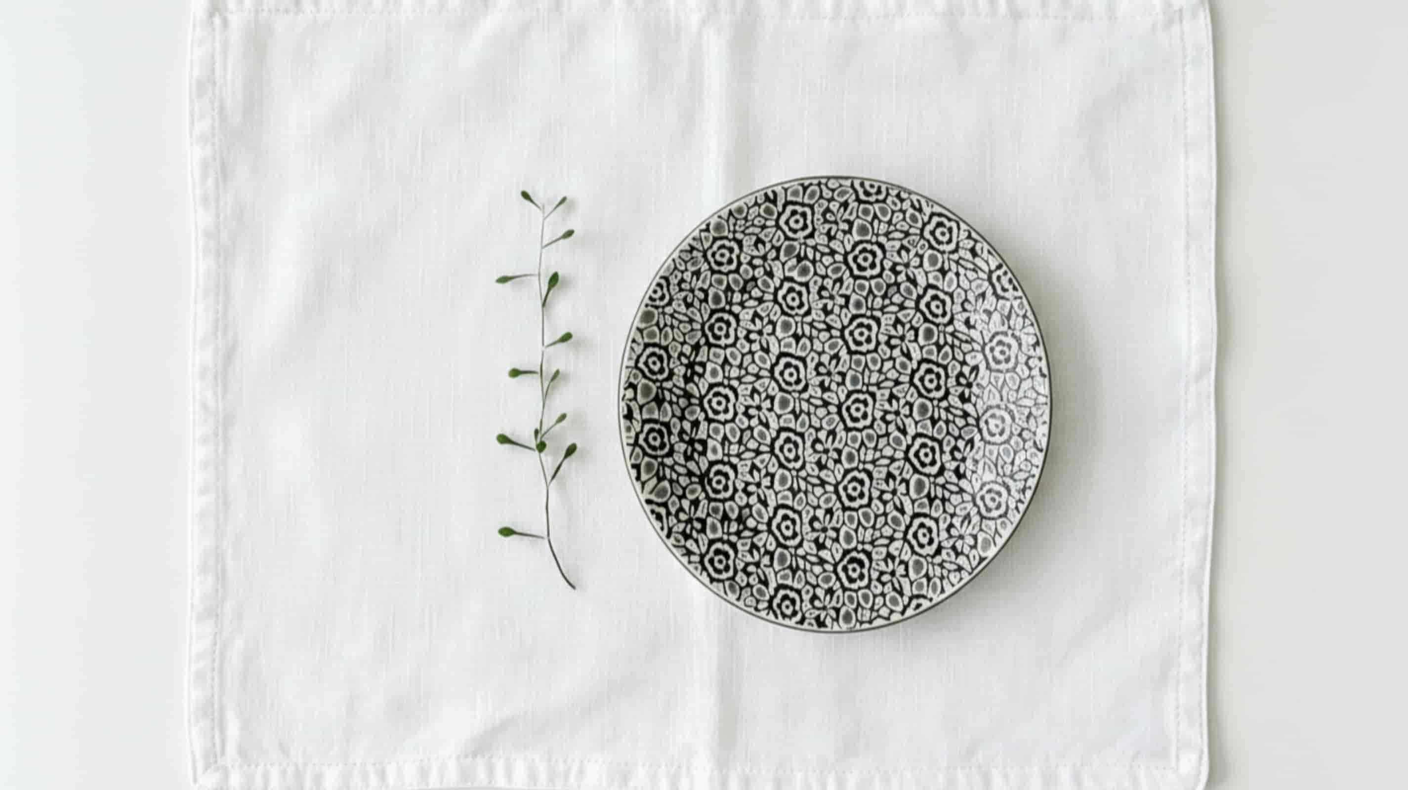 White wholesale linen placemat with ceramic plate overhead minimal