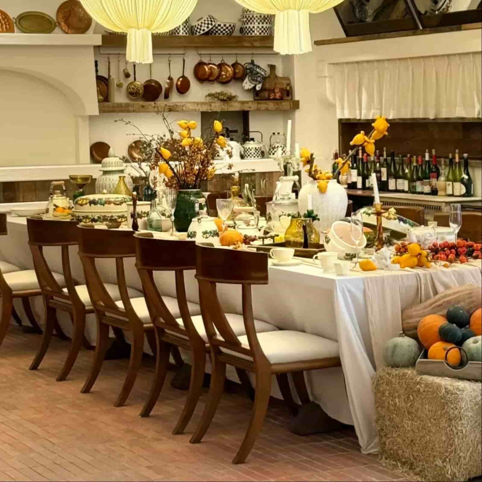 White linen table runner on banquet table in autumn Tuscan restaurant