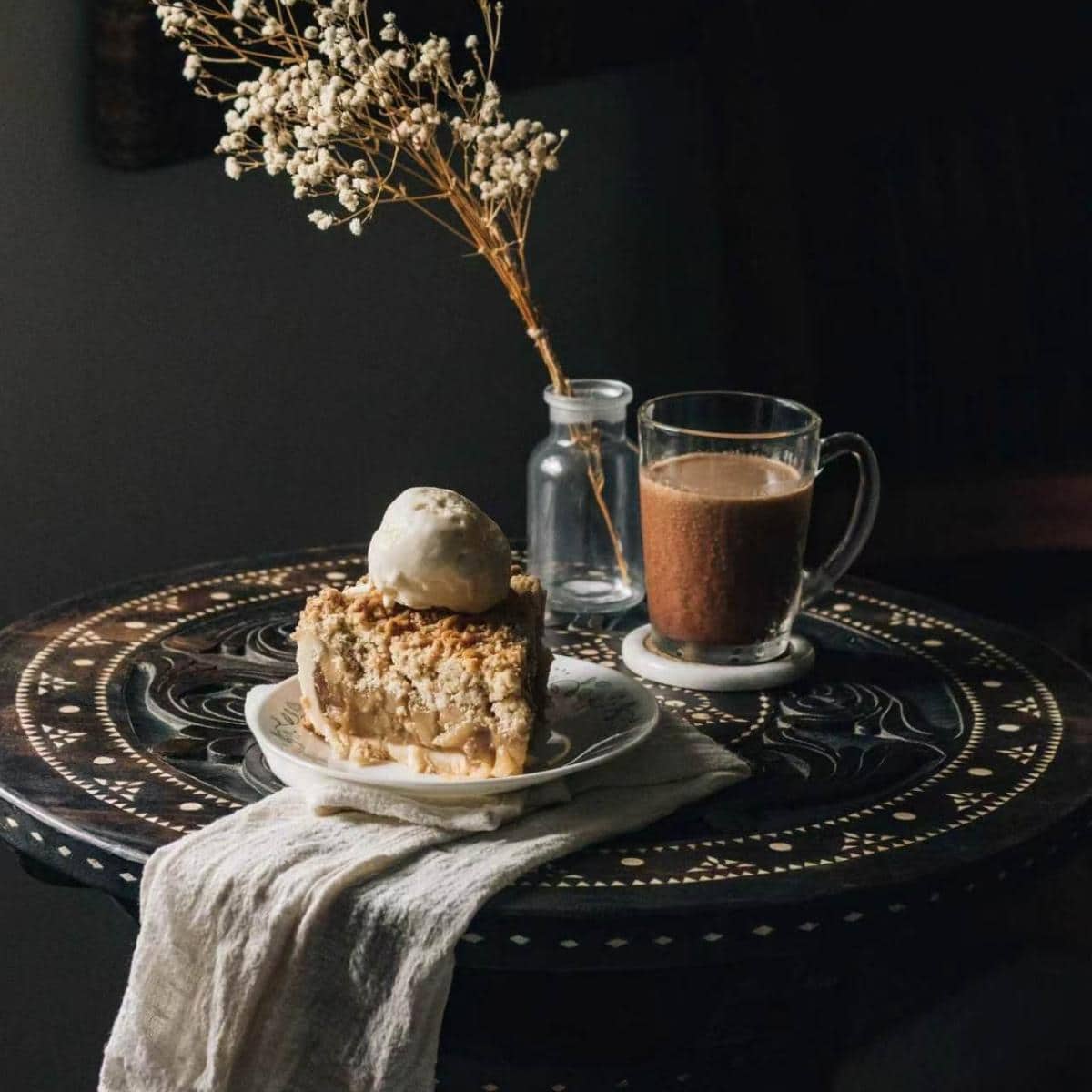 Wholesale linen napkin on cafe table with dessert and moody lighting