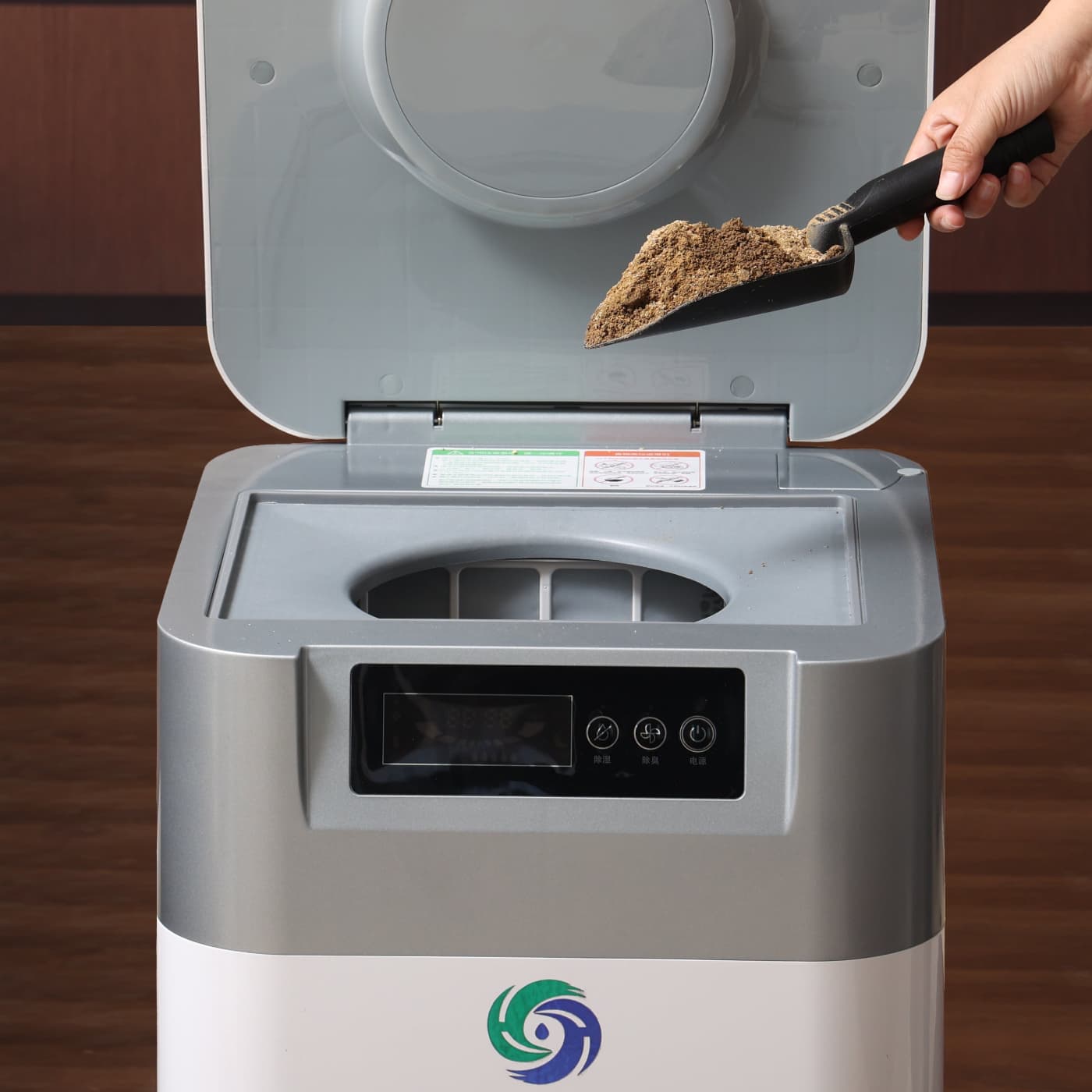 AI-controlled drying process releases moisture as water vapor, leaving nutrient-rich compost