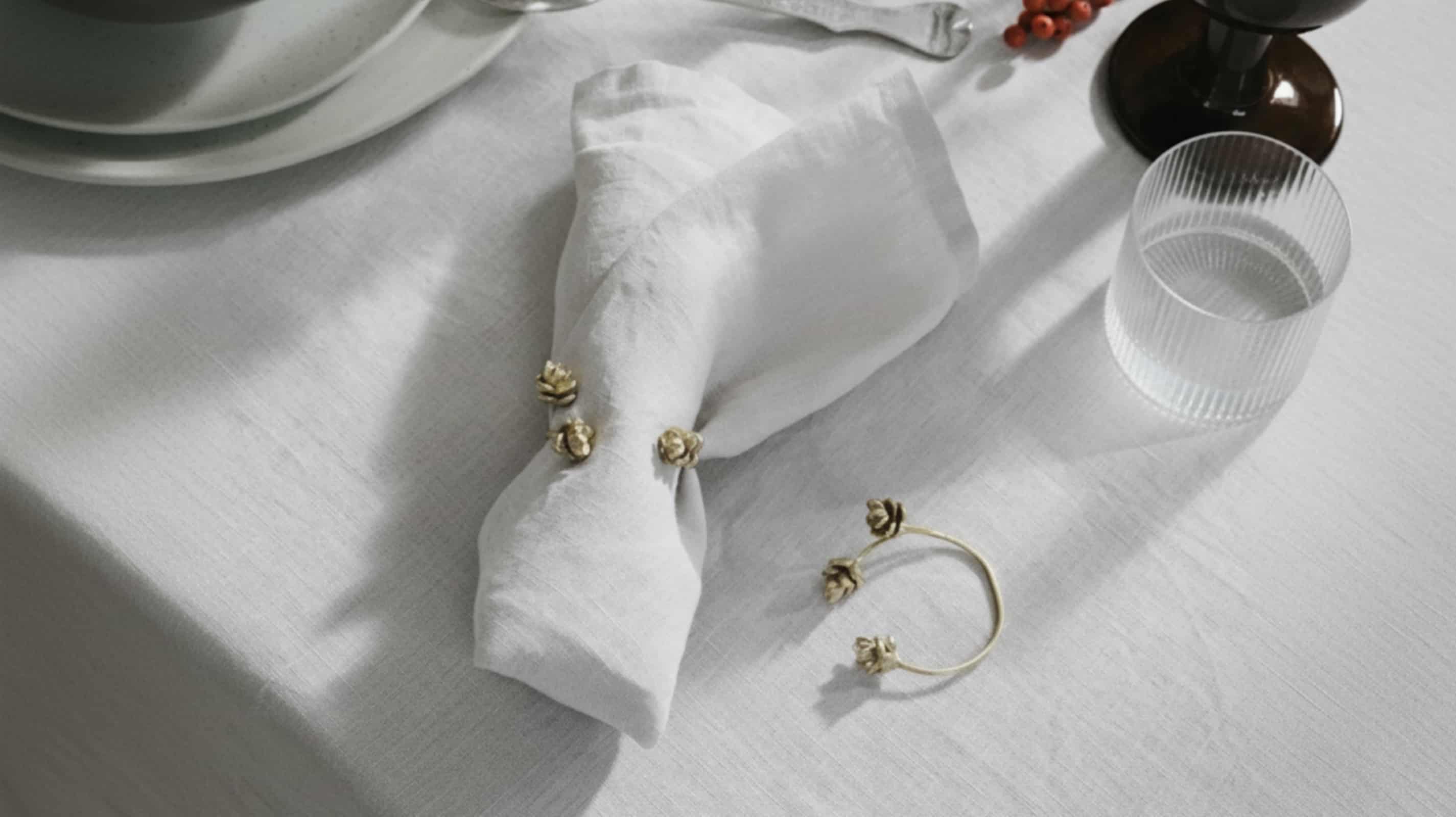 White grey wholesale linen napkin in restaurant tablescape
