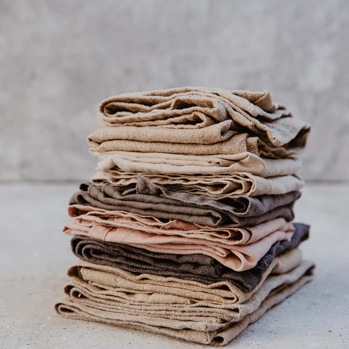 Folded wholesale linen napkins stacked for product display